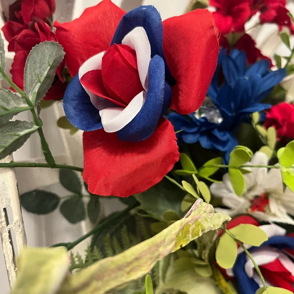 Patriotic Floral Arrangement with Red, Blue, and White Accents